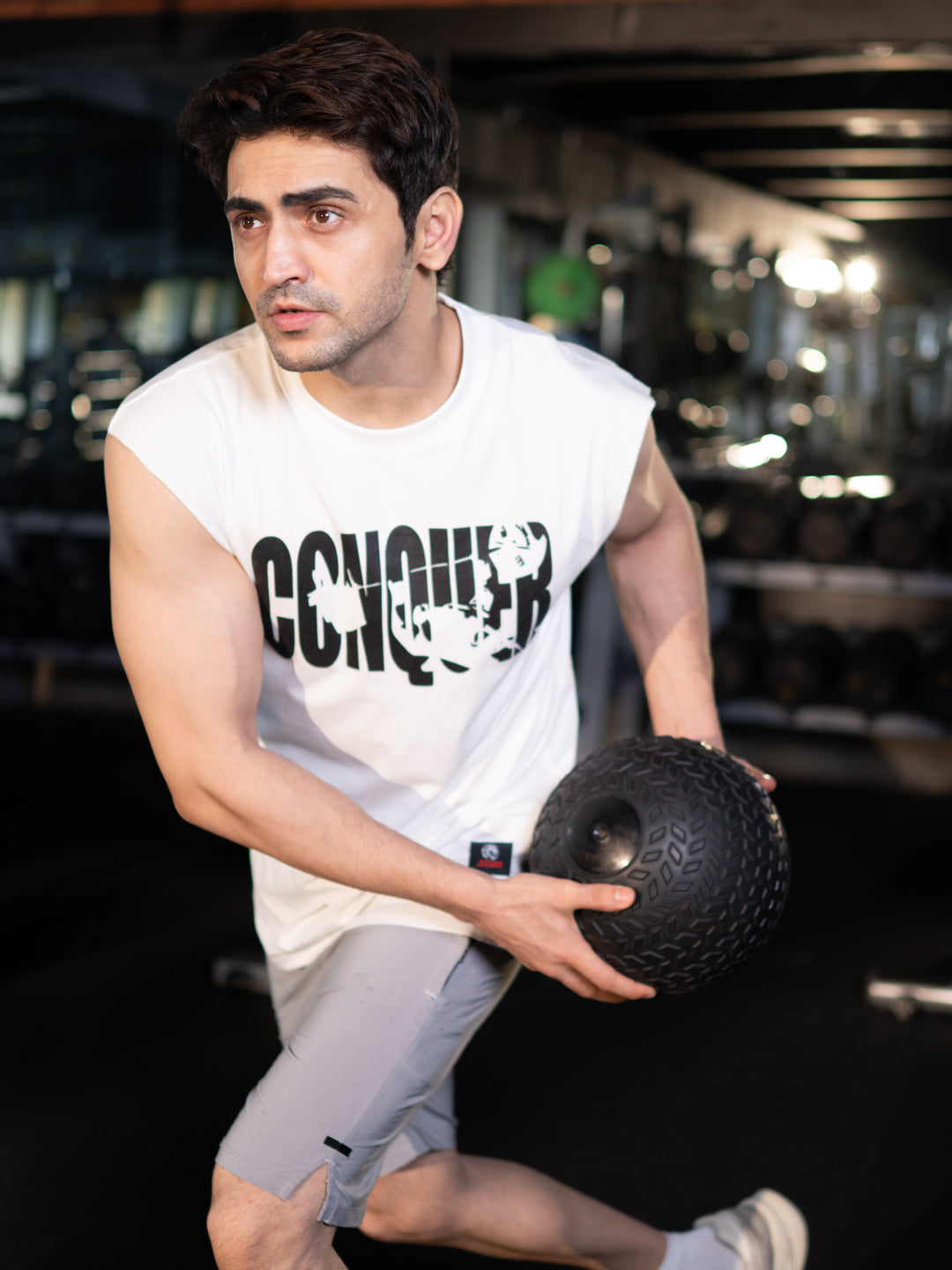 The Conquer Muscle Tee